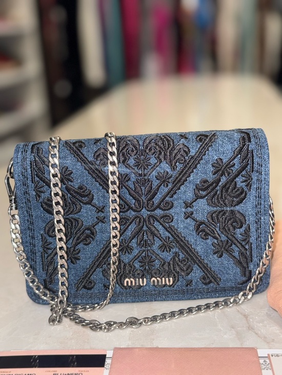 Miu Miu Handbags - Miu Miu Gorgeous very rare
Denim small bag with silver chain full set like New